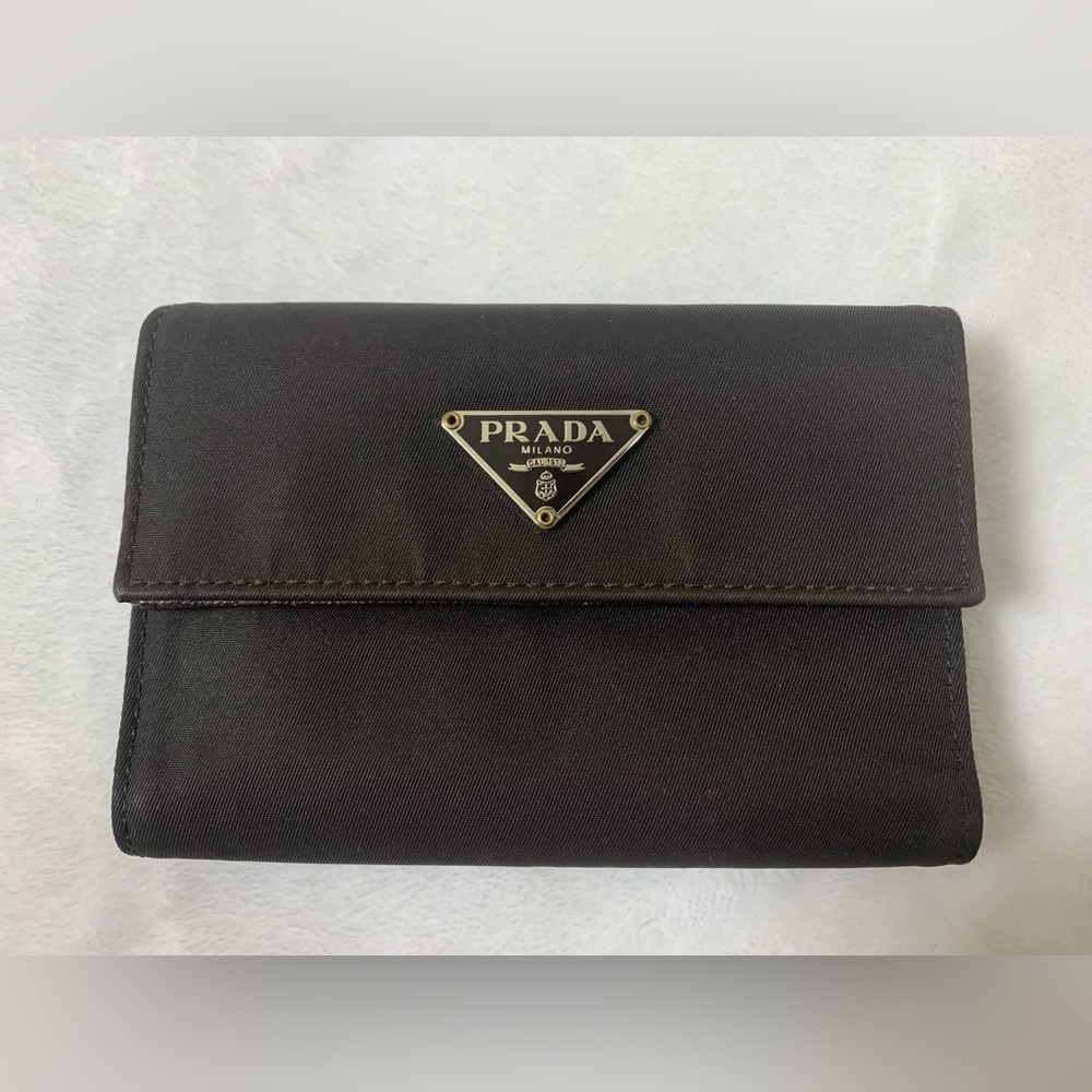 Prada trifold wallet. Dark brown